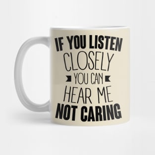 listen closely you can hear me not caring (black) Mug